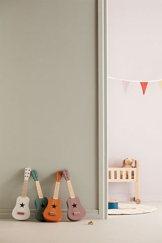 First toy guitar dark pink